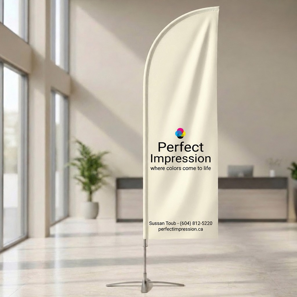 Feather flag standing in a bright office lobby