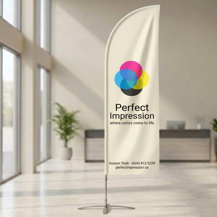 Feather flag standing in a bright office lobby