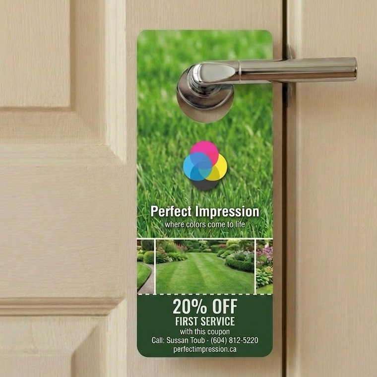 Tearoff door hanger on a lever door handle